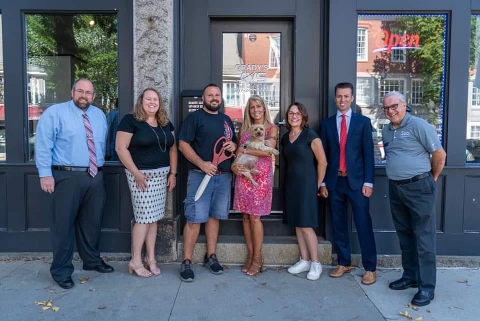 The Grady's AVS team outside the Saco, Maine storefront